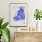 Présentation de l'œuvre au pastel sec Les Ailes du Changement dans un intérieur